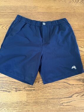 Tracksmith Men's Falmouth Shorts
Size Large Navy Blue Gold Hare Logo